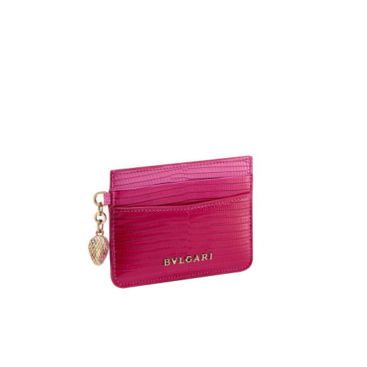 Serpenti Forever card holder in beetroot spinel fuchsia dégradé lizard skin. Captivating snakehead charm in light gold-plated brass embellished with red enamel eyes. SEA-CC-HOLDER-LD image 1