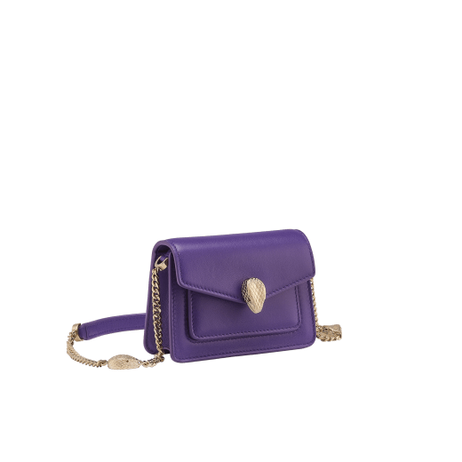 Serpenti Forever micro bag in amaranth garnet red calf leather. Captivating snakehead closure in light gold-plated brass embellished with red enamel eyes. SEA-MICROXBODY image 1