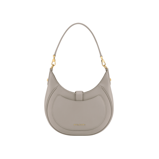 Serpenti Ellipse medium shoulder bag in Urban grain and smooth Niagara sapphire blue calf leather with cloud topaz blue gros grain lining. Captivating snakehead closure in gold-plated brass embellished with black onyx scales and red enamel eyes. 1190-UCL image 3