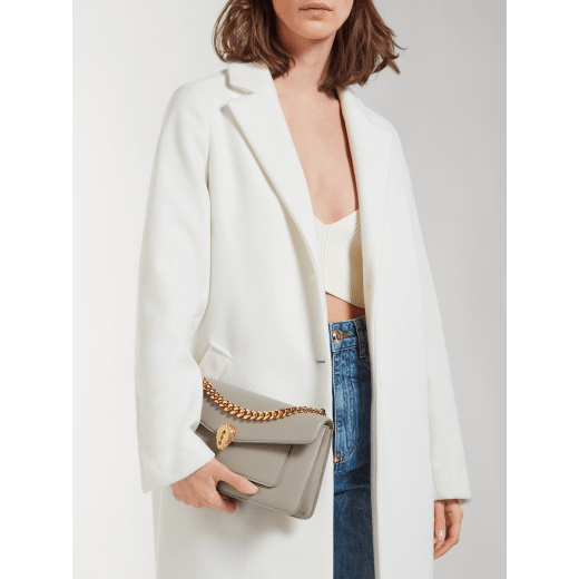 Serpenti East-West Maxi Chain medium shoulder bag in foggy opal grey Metropolitan calf leather with linen agate beige nappa leather lining. Captivating snakehead magnetic closure in gold-plated brass embellished with grey agate scales and red enamel eyes. SEA-1238-MCCL image 4