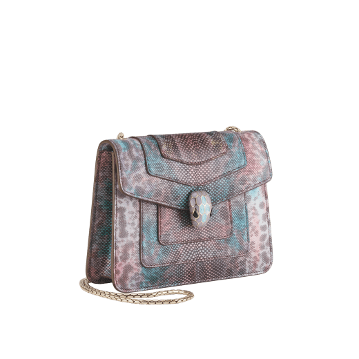 “Serpenti Forever” crossbody bag in white agate metallic karung skin. Iconic snakehead closure in light gold plated brass enriched with black and white agate enamel and black onyx eyes. 422-MK image 2