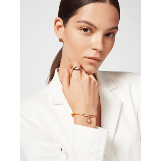 Serpenti Forever bracelet in Sahara amber light brown fabric. Gold-plated brass tubular element and captivating snakehead charm embellished with red enamel eyes. SERP-HERMINISTRING image 2