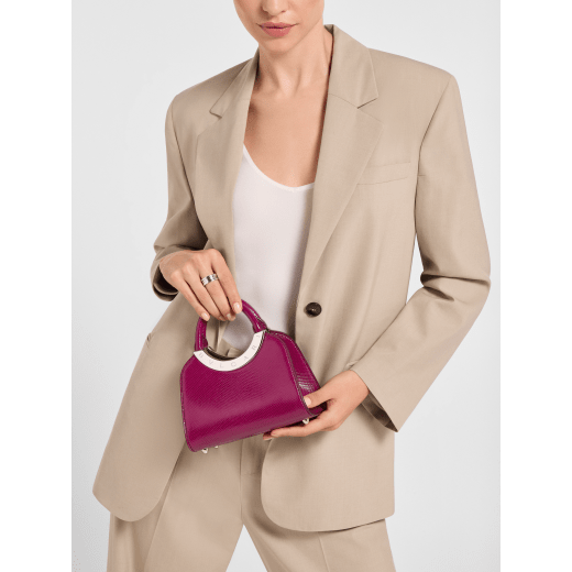 Bvlgari Roma mini top handle bag in midnight plum Pure karung with black nappa leather lining. Iconic metal detail in palladium-plated brass engraved with the Bvlgari logo, and magnetic press-button closure. BVR-001-1310XS-KAR image 1