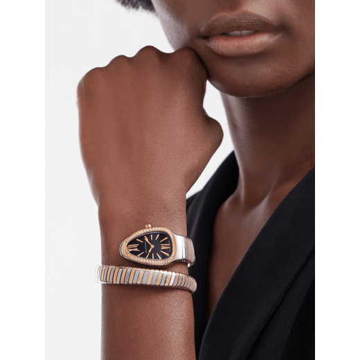 Serpenti Tubogas Lady watch with, 35 mm stainless steel curved case, 18 kt rose gold bezel set with diamonds, 18 kt rose gold crown set with a cabochon cut pink rubellite, black opaline dial with guilloché soleil treatment and hand-applied indexes, single spiral 18 kt rose gold and stainless steel bracelet. Quartz movement, hours and minutes functions. Water proof 30 m. 102098 image 1