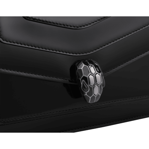 Serpenti Forever East-West small shoulder bag in black Shiny Brushed calf leather with black nappa leather lining. Captivating snakehead magnetic closure in dark ruthenium-plated brass embellished with black enamel and dark ruthenium-plated brass scales, and black onyx eyes. 1237-CLd image 5