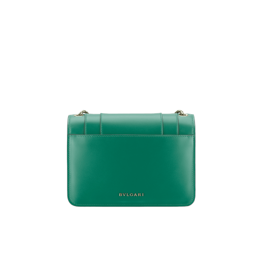 Serpenti Forever small crossbody bag in emerald green calf leather with amethyst purple grosgrain lining. Captivating snakehead closure in light gold-plated brass embellished with black and white agate enamel scales and green malachite eyes. 1082-CLa image 3