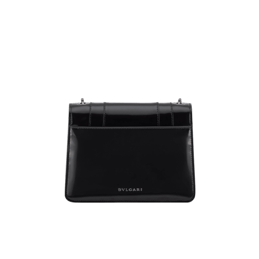 Serpenti Forever small crossbody bag in silver Striated calf leather with foggy opal grey nappa leather lining. Captivating snakehead magnetic closure in light gold-plated brass embellished with brushed grey enamel and light gold-plated brass scales and black onyx eyes. 422-CLc image 3