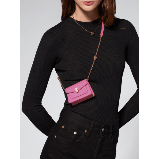 Serpenti Forever micro bag in amaranth garnet red calf leather. Captivating snakehead closure in light gold-plated brass embellished with red enamel eyes. SEA-MICROXBODY image 5