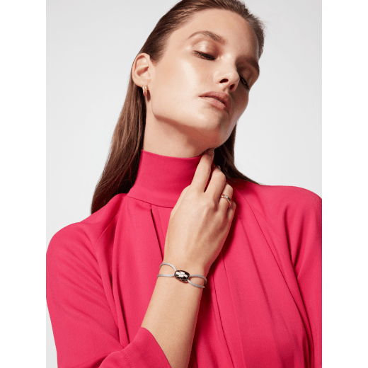 Serpenti Forever bracelet in foggy opal gray fabric. Captivating light gold-plated brass snakehead embellishment with black and white agate enamel scales and black enamel eyes. SERP-STRINGf image 2