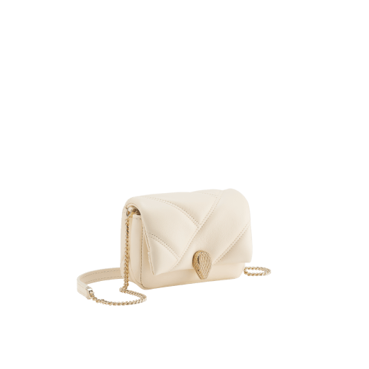 Serpenti Cabochon micro bag in ivory opal calf leather with a maxi matelassé pattern and black nappa leather lining. Captivating snakehead closure in gold-plated brass embellished with red enamel eyes. SCB-NANOCABOCHONa image 1