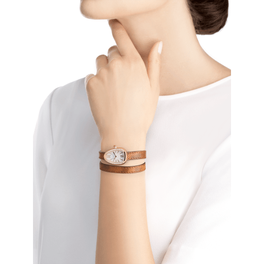 Serpenti watch with 18 kt rose gold case set with brilliant cut diamonds, white mother-of-pearl dial and interchangeable double spiral bracelet in brown karung leather. 102727 image 4