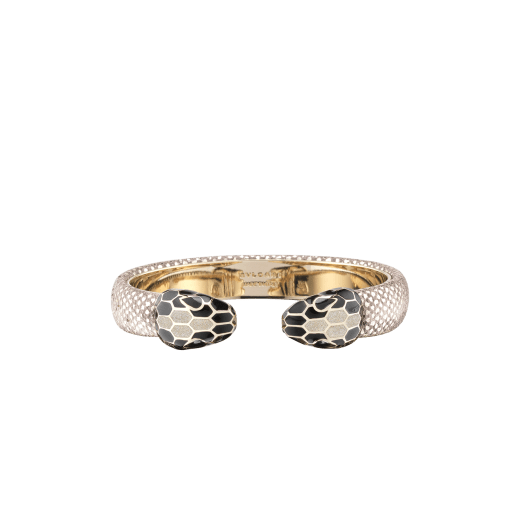 Serpenti Forever bangle bracelet in milky opal metallic karung skin, with brass light gold plated hardware. Iconic contraire snakehead décor in black and glitter milky opal enamel, with black enamel eyes. SPContr-MK-MO image 1