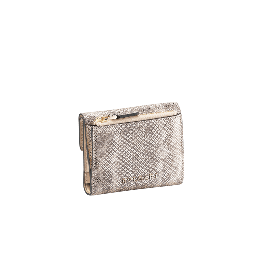 "Serpenti Forever" slim compact wallet in "Molten" light gold karung skin and black calf leather. New Serpenti head stud closure in gold plated brass, finished with red enamel eyes. SEA-SLIMCOMPACT-MK image 3