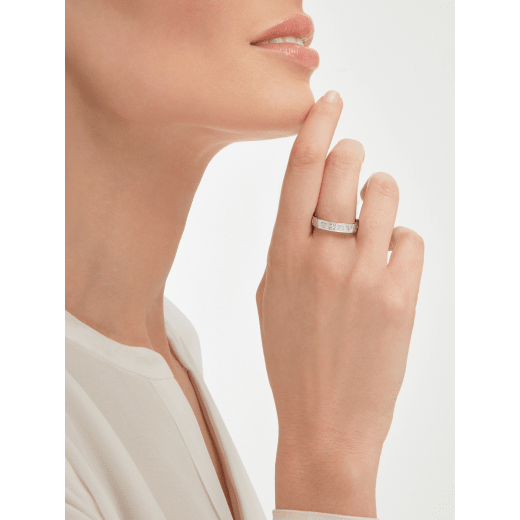 BVLGARI BVLGARI couples' rings, one in 18 kt white gold set with a diamond and one in platinum. A timeless ring set blending modern design with distinctive refinement. BVLGARI-BVLGARI-COUPLES-RINGS-3 image 3
