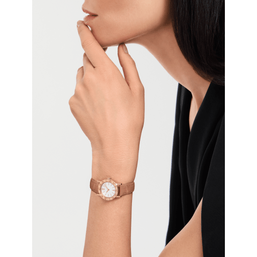 Bvlgari Bvlgari watch with 18 kt rose gold case and bezel engraved with double logo, white opaline dial and beige alligator bracelet. Water-resistant up to 30 metres 103966 image 1