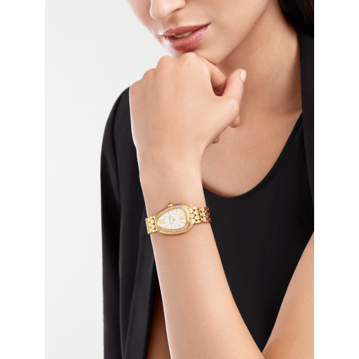 Serpenti Seduttori watch with 18 kt yellow gold case, 18 kt yellow gold bracelet, 18 kt yellow gold bezel set with diamonds and a white silver opaline dial. 103942 image 1