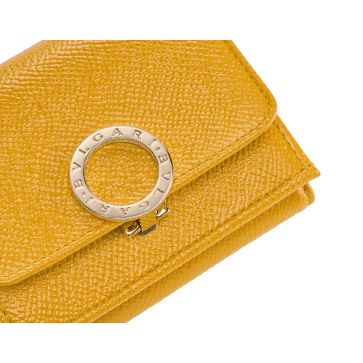 BULGARI BULGARI Japan Exclusive compact wallet in soft drummed taupe quartz light brown calf leather with crystal rose nappa leather interior. Iconic light gold-plated brass clip and press button closure. 579-MINICOMPACTc image 4