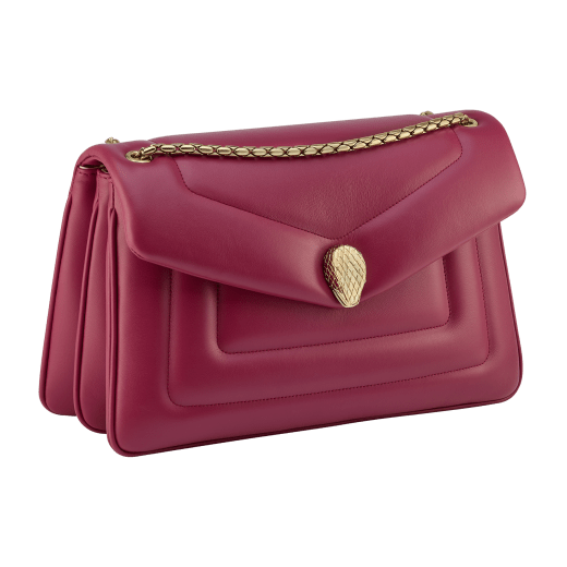 Serpenti Reverse medium shoulder bag in Sahara amber light brown quilted Metropolitan calf leather with taffy quartz pink nappa leather lining. Captivating snakehead magnetic closure in gold-plated brass embellished with red enamel eyes. 1223-MCL image 4