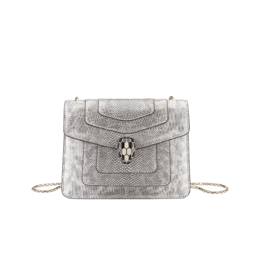 “Serpenti Forever” crossbody bag in white agate metallic karung skin. Iconic snakehead closure in light gold plated brass enriched with black and white agate enamel and black onyx eyes. 422-MK image 1