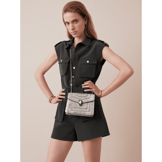 “Serpenti Forever” crossbody bag in white agate metallic karung skin. Iconic snakehead closure in light gold plated brass enriched with black and white agate enamel and black onyx eyes. 422-MK image 5