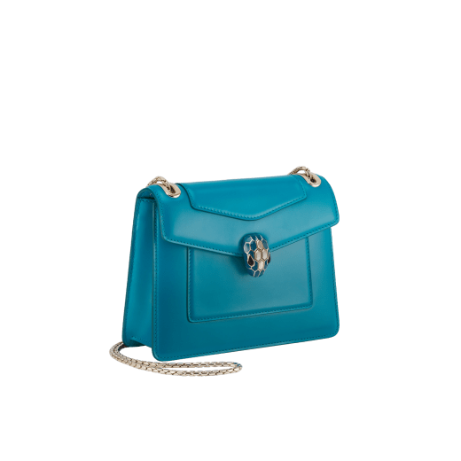 Serpenti Forever Day-to-Night small shoulder bag in emerald green calf leather with black nappa leather lining. Captivating snakehead magnetic closure in light gold-plated brass embellished with deep jade intense green enamel and light gold-plated brass scales, and black onyx eyes. SEA-1281-CL image 2