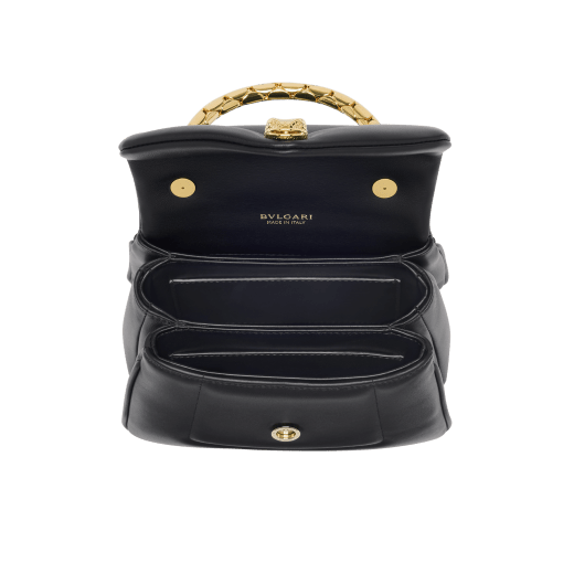 Serpenti Reverse small top handle bag in black quilted Metropolitan calf leather with black nappa leather lining. Captivating snakehead magnetic closure in gold-plated brass embellished with red enamel eyes. 1234-MCL image 4