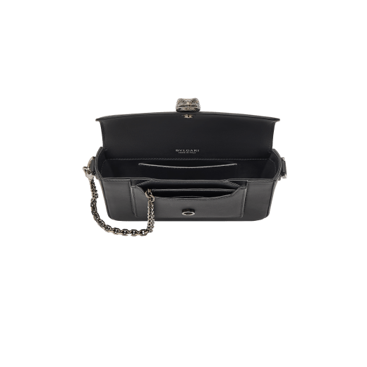 Serpenti Forever small unisex crossbody bag in matt black calf leather with black nappa leather lining and decorative chain. Captivating snakehead closure in dark ruthenium-plated brass embellished with red enamel eyes. 293022 image 4