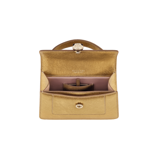 Serpenti Forever mini top handle bag in black calf leather with black nappa leather lining. Captivating snakehead magnetic closure in light gold-plated brass embellished with black enamel and light gold-plated brass scales, and black onyx eyes. SEA-1283-CL image 4