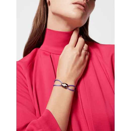 "Serpenti Forever" bracelet in Rose Gold pink fabric with a light gold-plated brass iconic snakehead embellishment enamelled in black and white agate, with seductive black enamel eyes. SERP-STRINGg image 1