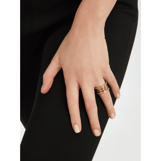 B.zero1 Rock couple rings in 18 kt yellow gold with studded spiral and pavé diamonds on the edges. A timeless ring set fusing visionary design with bold charisma. BZERO1-ROCK-COUPLES-RINGS image 6