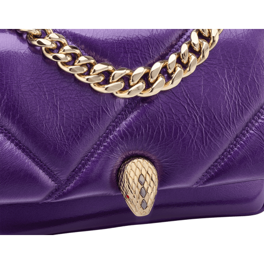 Serpenti Cabochon Maxi Chain mini crossbody bag in vivid amethyst purple calf leather with graphic maxi quilted motif and emerald green nappa leather lining. Captivating magnetic snakehead closure in light gold-plated brass embellished with dark grey hematite scales and red enamel eyes. 292886 image 5