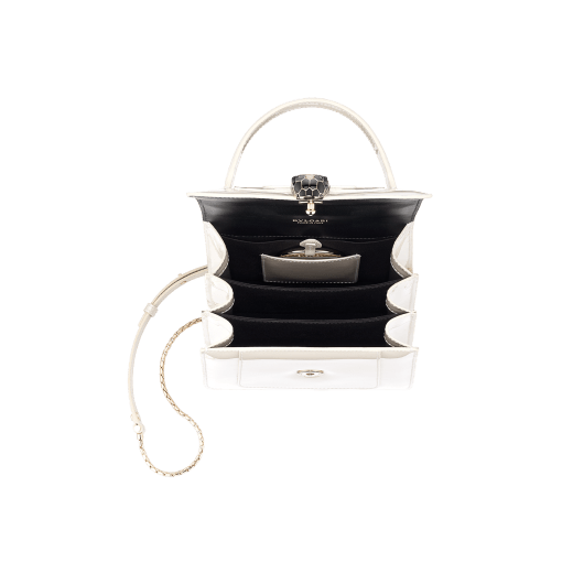 “Serpenti Forever ” top handle bag in white agate calf leather with a varnished and pearled effect, and black gros grain internal lining. Tempting snakehead closure in light gold plated brass enriched with black and pearled white agate enamel and black onyx eyes 1122-VCL image 4