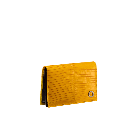Business card holder in black shiny lizard skin and calf leather with brass palladium plated BVLGARI BVLGARI motif. Three credit card slots, one open pocket and Business cards compartment. BBM-BC-HOLD-SIMPLE-sl image 1