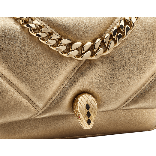 Serpenti Cabochon Maxi Chain mini crossbody bag in soft flash diamond calf leather with maxi graphic quilted motif and deep jade green nappa leather lining. Captivating snakehead magnetic closure in light gold-plated brass embellished with white mother-of-pearl scales and red enamel eyes. 1164-NSMa image 4