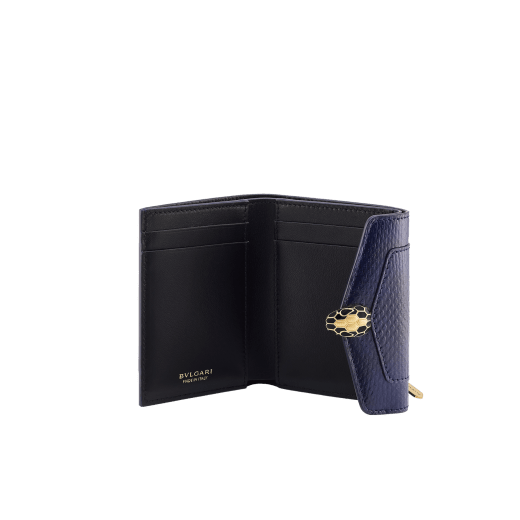 Serpenti Forever compact wallet in shiny midnight plum karung with black nappa leather interior. Captivating snakehead press-button closure in palladium-plated brass embellished with midnight plum enamel and palladium-plated brass scales and black enamel eyes. SEA-SLIM-COMPACT-R-kar image 2