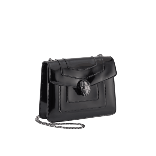 Serpenti Forever small crossbody bag in silver Striated calf leather with foggy opal grey nappa leather lining. Captivating snakehead magnetic closure in light gold-plated brass embellished with brushed grey enamel and light gold-plated brass scales and black onyx eyes. 422-CLc image 2
