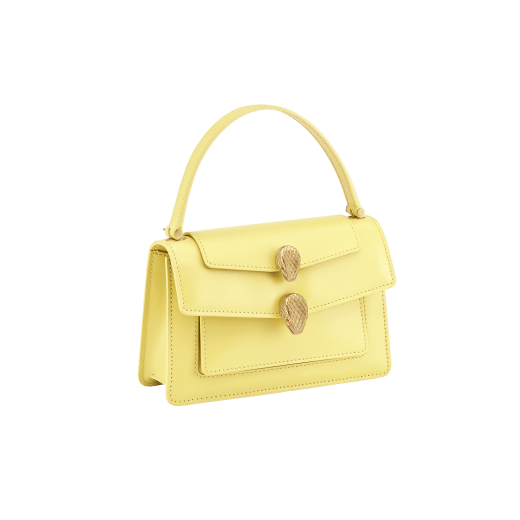 Alexander Wang x Bulgari small belt bag in sunbeam citrine calf leather with black nappa leather lining. Captivating double Serpenti head closure in antique gold-plated brass embellished with red enamel eyes. 291889 image 2