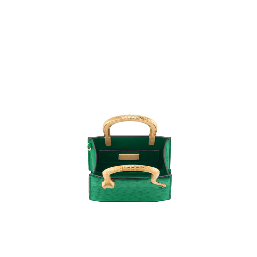 Serpentine mini tote bag in vivid emerald green shiny ostrich skin with vivid emerald green nappa leather lining. Captivating snake body-shaped handles in gold-plated brass embellished with engraved scales and red enamel eyes. 293262 image 4