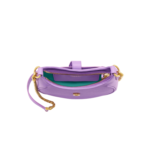 Serpenti Ellipse small crossbody bag in Urban grain and smooth ivory opal calf leather with flamingo quartz pink gros grain lining. Captivating snakehead closure in gold-plated brass embellished with black onyx scales and red enamel eyes. 1204-UCLa image 4