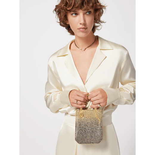 Serpentine mini tote bag in natural suede with different-size degradé gold crystals and black nappa leather lining. Captivating snake body-shaped handles in gold-plated brass embellished with engraved scales and red enamel eyes. 292824 image 6