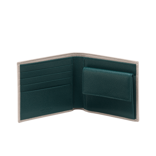 BULGARI BULGARI men's compact wallet in Niagara sapphire blue full-grain calf leather with denim sapphire blue full-grain calf leather interior. Iconic palladium-plated brass hardware and folded closure. BBM-WLT-ITAL-gclb image 2