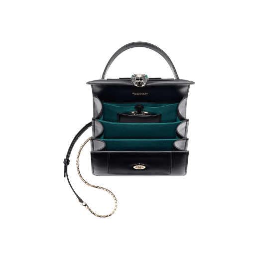 Serpenti Forever small top handle bag in white agate calf leather with heather amethyst fuchsia grosgrain lining. Captivating snakehead closure in light gold-plated brass embellished with black and white agate enamel scales and green malachite eyes. 1122-CLa image 4