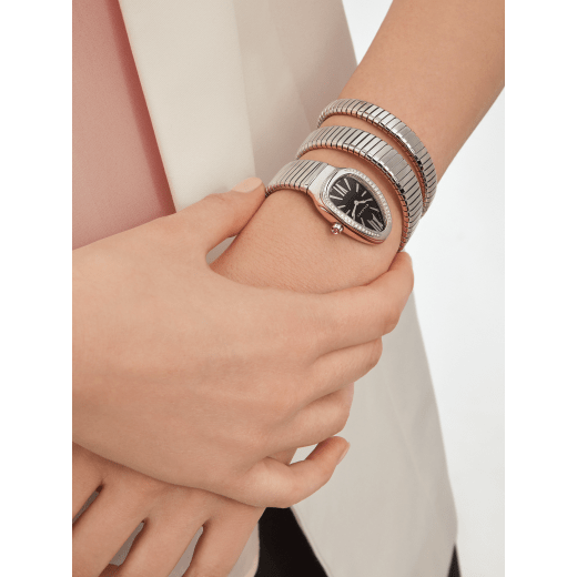 Serpenti Tubogas double spiral watch with stainless steel case and bracelet, bezel set with brilliant-cut diamonds and black dial with guilloché soleil treatment. Water-resistant up to 30 metres. SP35BSDS-WG-2T image 1