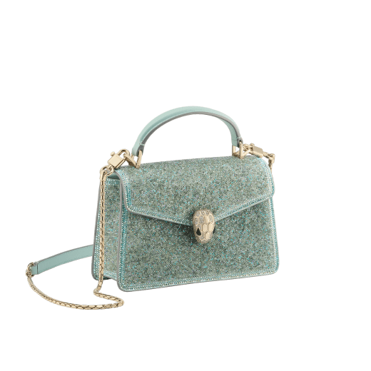 Serpenti Forever mini top handle bag in black Crystal Sparkle suede with black nappa leather lining. Captivating snakehead magnetic closure in gold-plated brass embellished with black zirconia pavé and gold-plated brass scales, and black onyx eyes. SEA-1283-CS image 2