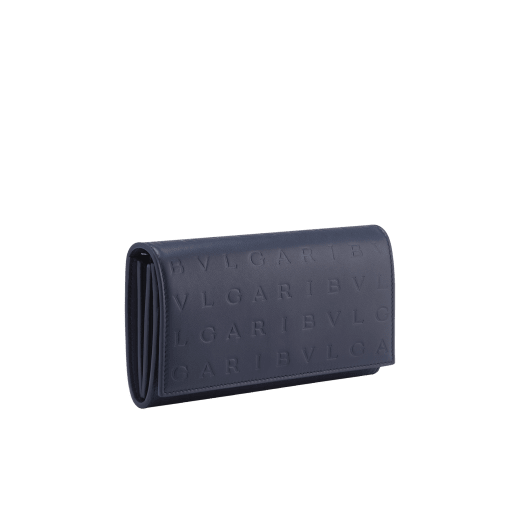 Bulgari Logo large wallet in Poseidon lapis blue calf leather with hot-stamped Infinitum pattern all over and Poseidon lapis blue calf leather interior. Dark ruthenium-plated brass hardware and magnetic closure. BVL-LONGWALLETb image 1