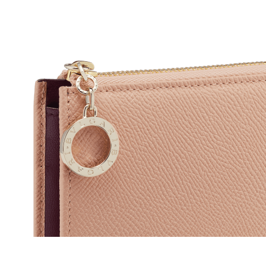 BULGARI BULGARI large L-shaped zipped wallet in bright, anemone spinel pinkish-red grained calf leather with primrose quartz pink nappa leather interior. Zip-around closure with iconic light gold-plated zip puller. 579-WLT-MZP-SLIM-Lc image 4