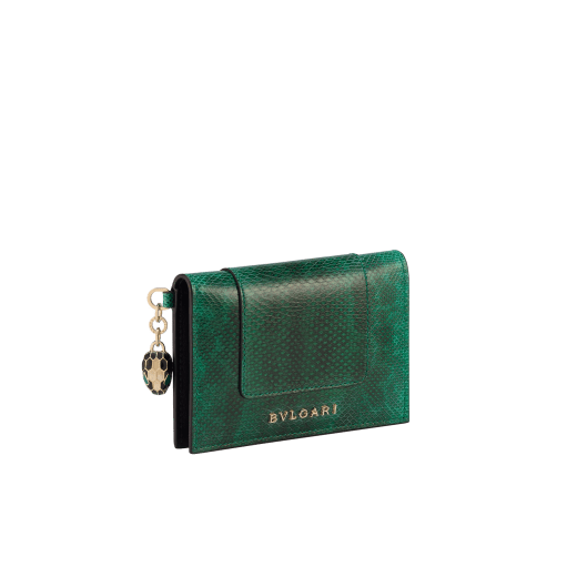 "Serpenti Forever" folded card holder in "Molten" light gold karung skin and black calf leather. New Serpenti head charm in gold-plated brass, finished with red enamel eyes. SEA-CC-HOLDER-FOLD-MKa image 1