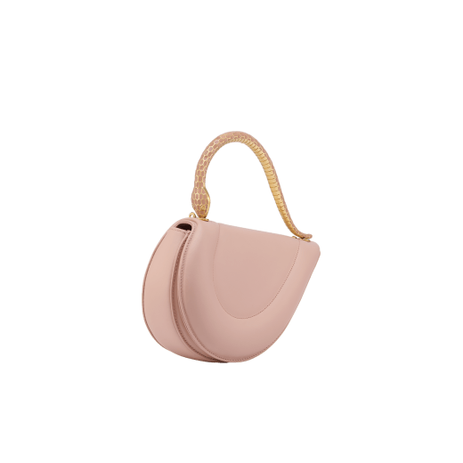 Serpenti Cuore 1968 top handle bag in star rose pink calf leather with crystal rose nappa leather lining. Captivating snake body-shaped top handle in gold-plated brass embellished with star rose pink enamel scales and zirconia eyes; press-button closure. SRN-001-1326S image 2