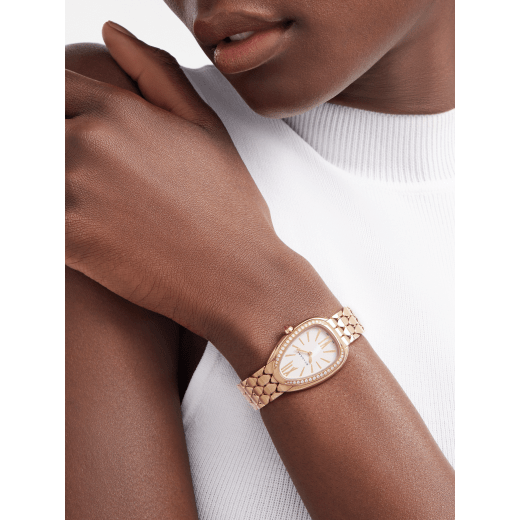Serpenti Seduttori watch with 18 kt rose gold case, 18 kt rose gold bracelet, 18 kt rose gold bezel set with diamonds and a white silver opaline dial. 103941 image 1