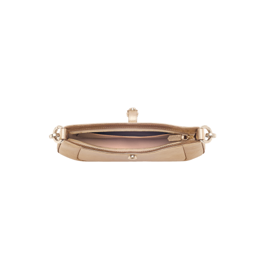 Serpenti Baia small shoulder bag in silver Striated calf leather with foggy opal grey nappa leather lining. Captivating snakehead magnetic closure in light gold-plated brass embellished with brushed grey enamel and light gold-plated brass scales and black onyx eyes; additional zipped top closure. SEA-001-1274S-STRI image 3